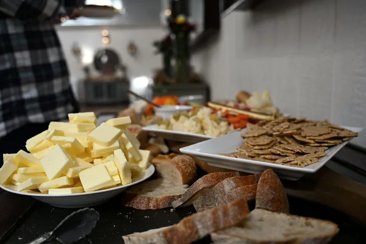 A cheese and charcuterie board set out for a corporate lunch at a farm venue near Knoxville.
