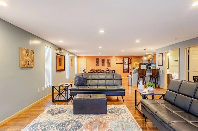 Spread out across the open living and dining room of Executive Apartment B, minutes from the fluffy cow farm just outside the Smoky Mountains.