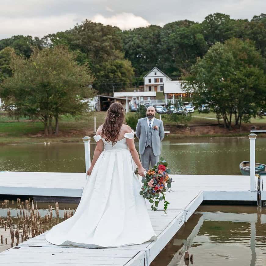A bride crossing the Floating Dock over the pond