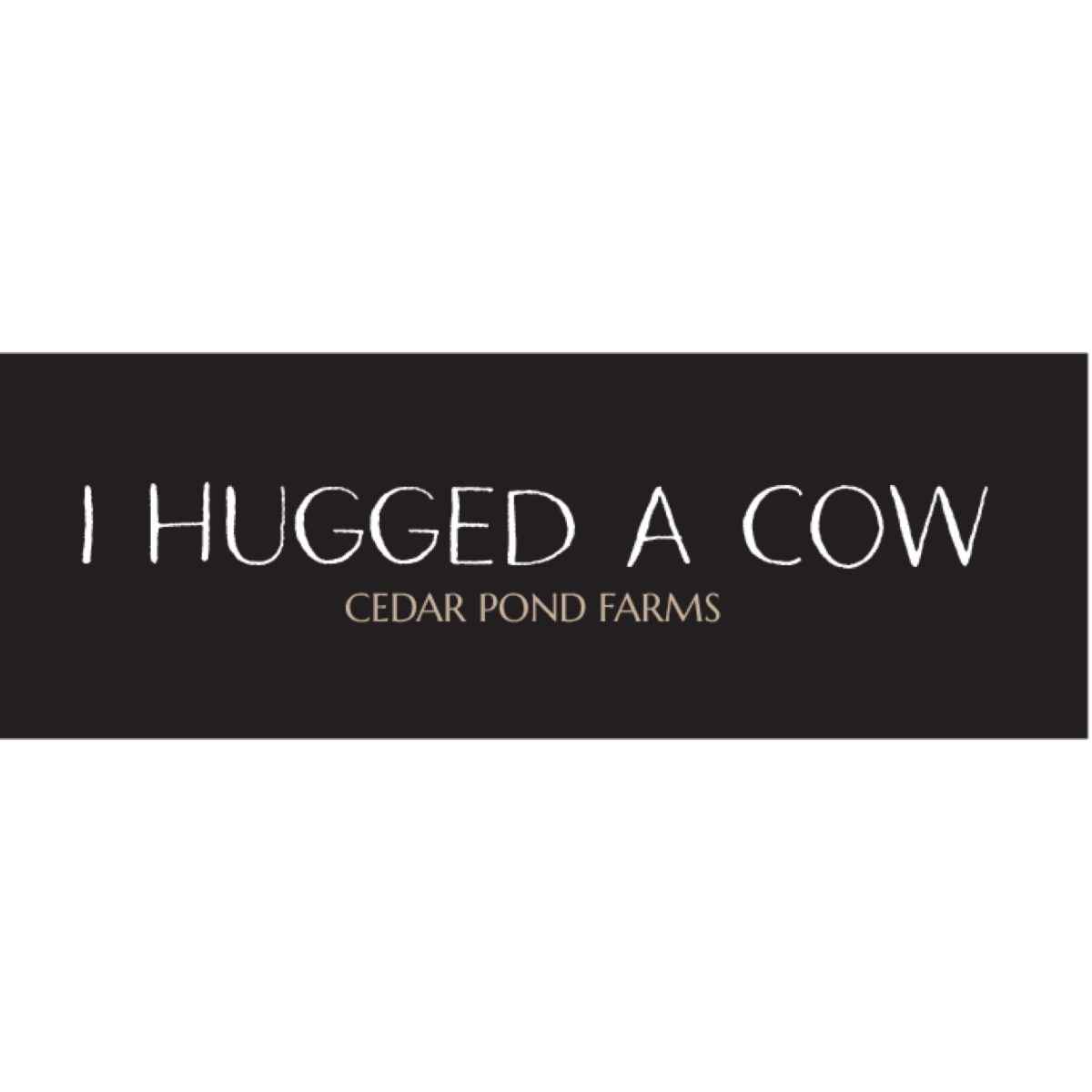 I Hugged A Cow at the Cedar Pond Farms gift shop — our fluffy Highland cow farm just outside the Smoky Mountains.