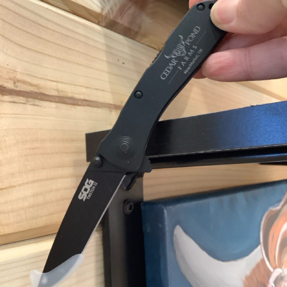 Pocket Knife at the Cedar Pond Farms gift shop — our fluffy Highland cow farm just outside the Smoky Mountains.