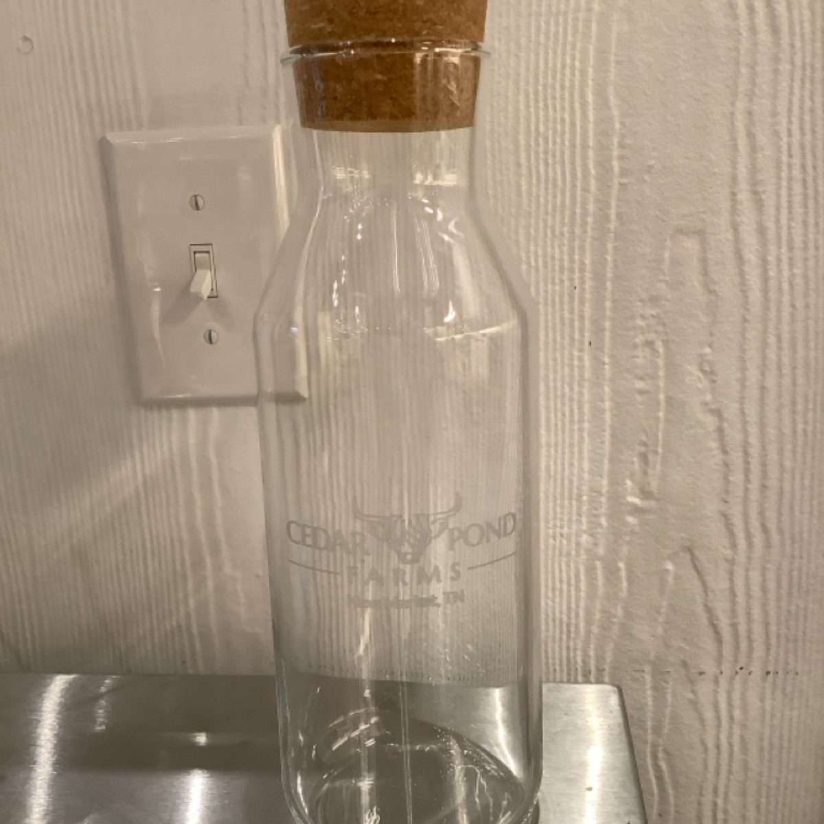 Glass Bottle With Cork at the Cedar Pond Farms gift shop — our fluffy Highland cow farm just outside the Smoky Mountains.