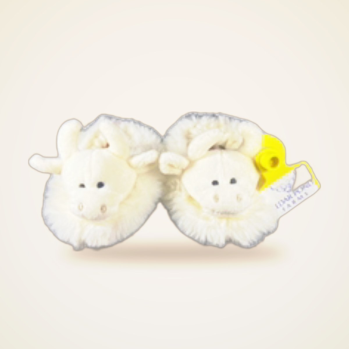 Fluffy Cow Baby Shoes from the STUFFIES shelf at the Cedar Pond Farms gift shop — our fluffy Highland cow farm just outside the Smoky Mountains.