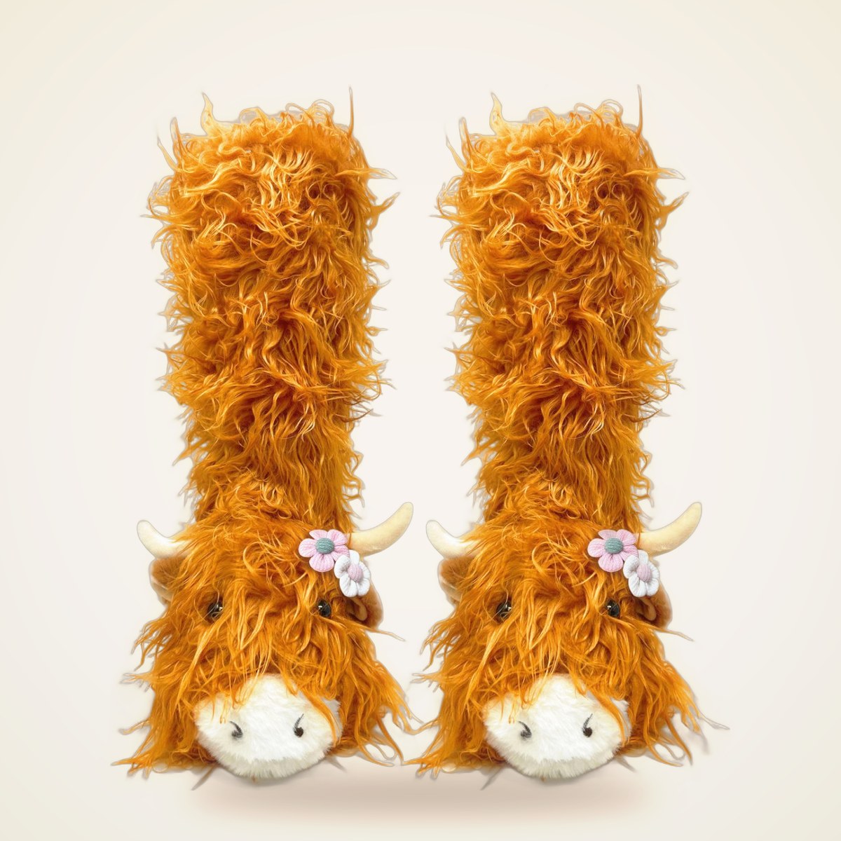 Highland Cattle Children’s/Adult’s Plush Non-Slip Slipper Socks from the APPAREL shelf at the Cedar Pond Farms gift shop — our fluffy Highland cow farm just outside the Smoky Mountains.