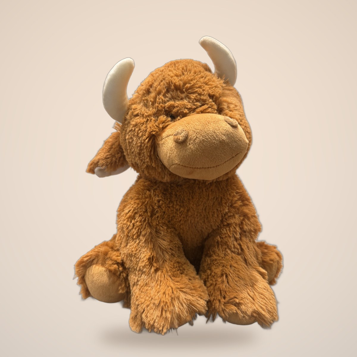LARGE COW — Brown Cow from the STUFFIES shelf at the Cedar Pond Farms gift shop — our fluffy Highland cow farm just outside the Smoky Mountains.