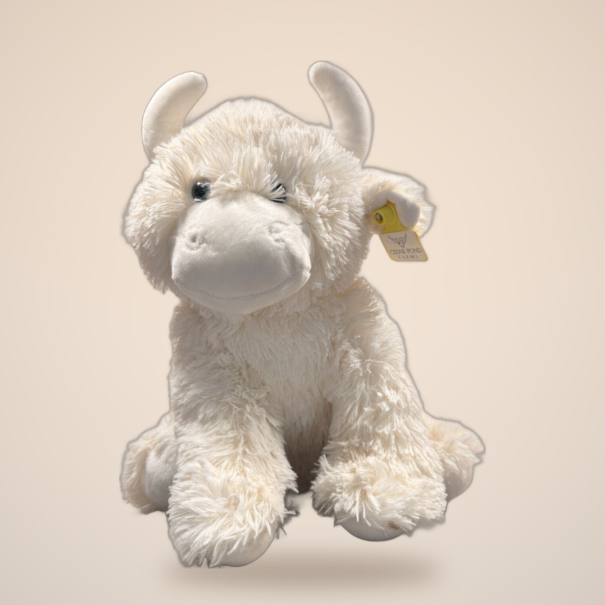 LARGE COW — White Cow from the STUFFIES shelf at the Cedar Pond Farms gift shop — our fluffy Highland cow farm just outside the Smoky Mountains.