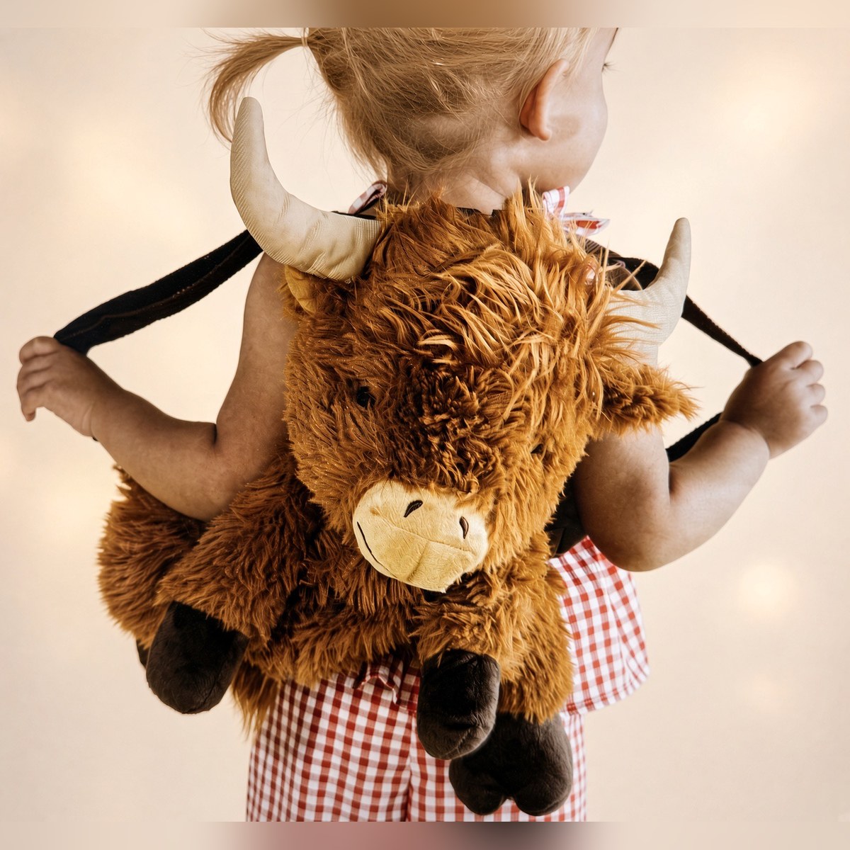 Backpack from the STUFFIES shelf at the Cedar Pond Farms gift shop — our fluffy Highland cow farm just outside the Smoky Mountains.