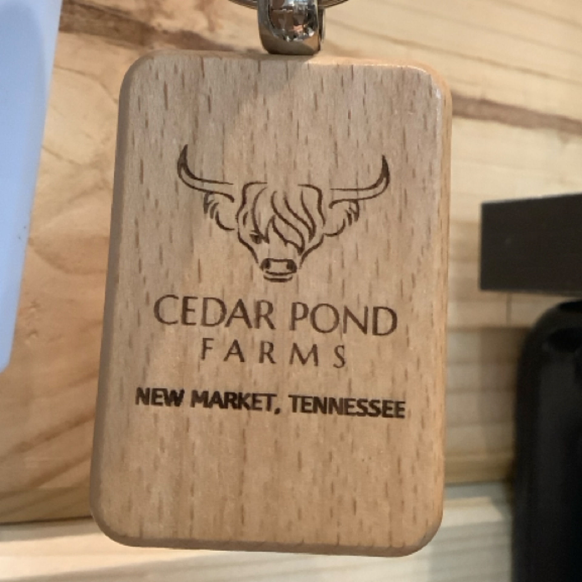 Rectangle Keychain at the Cedar Pond Farms gift shop — our fluffy Highland cow farm just outside the Smoky Mountains.