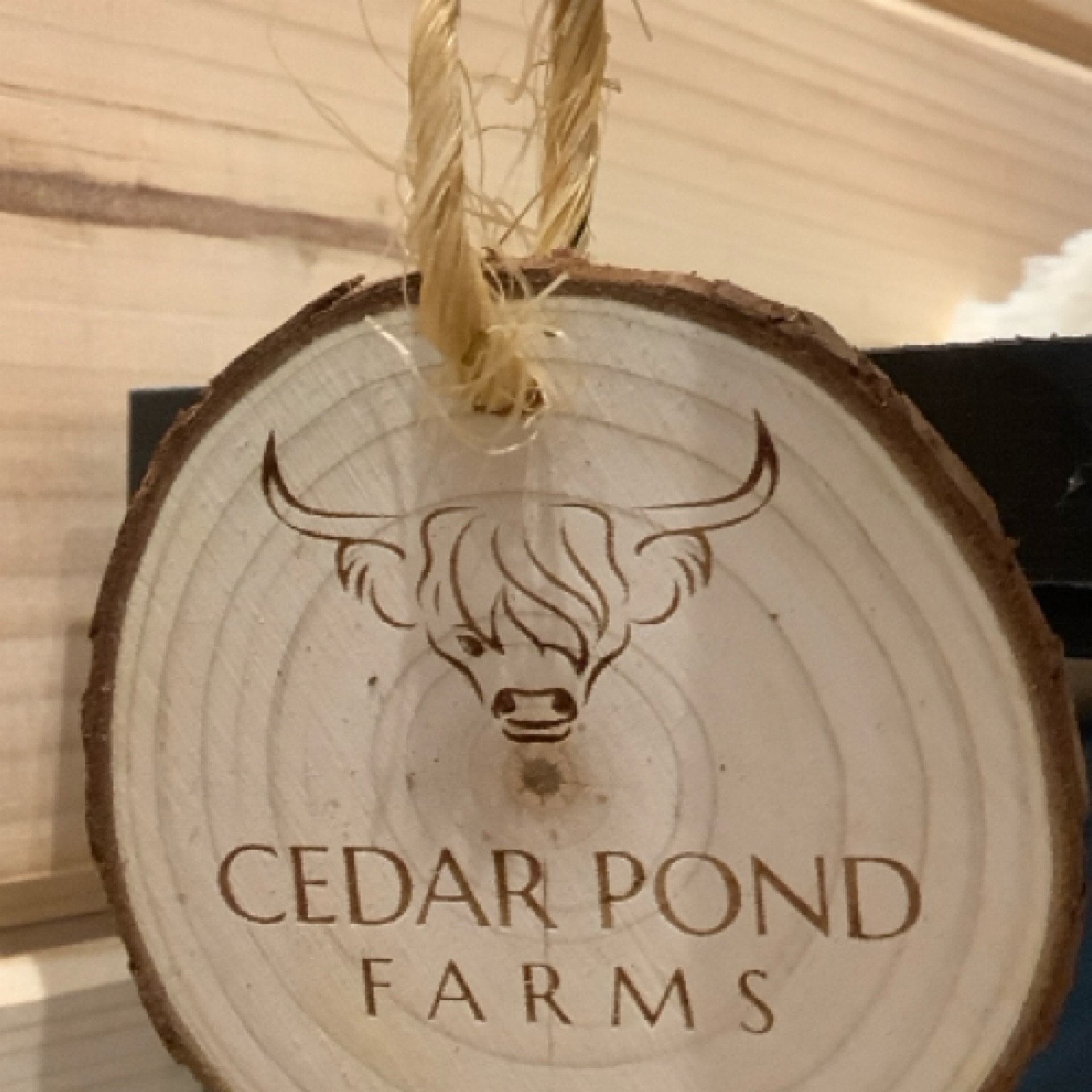 Wood Ornament at the Cedar Pond Farms gift shop — our fluffy Highland cow farm just outside the Smoky Mountains.