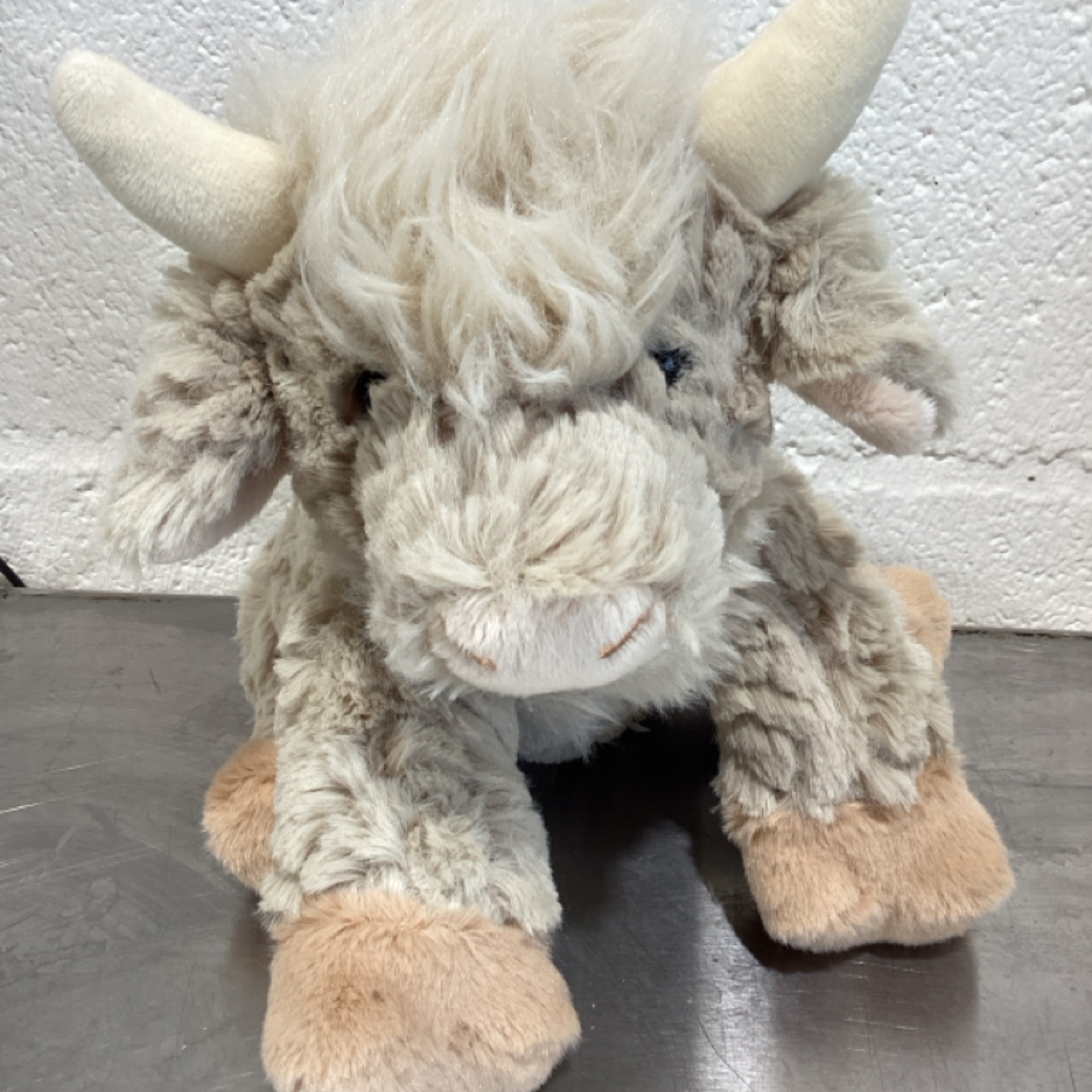 Putty Colored Highland Cow Stuffed Animal at the Cedar Pond Farms gift shop — our fluffy Highland cow farm just outside the Smoky Mountains.