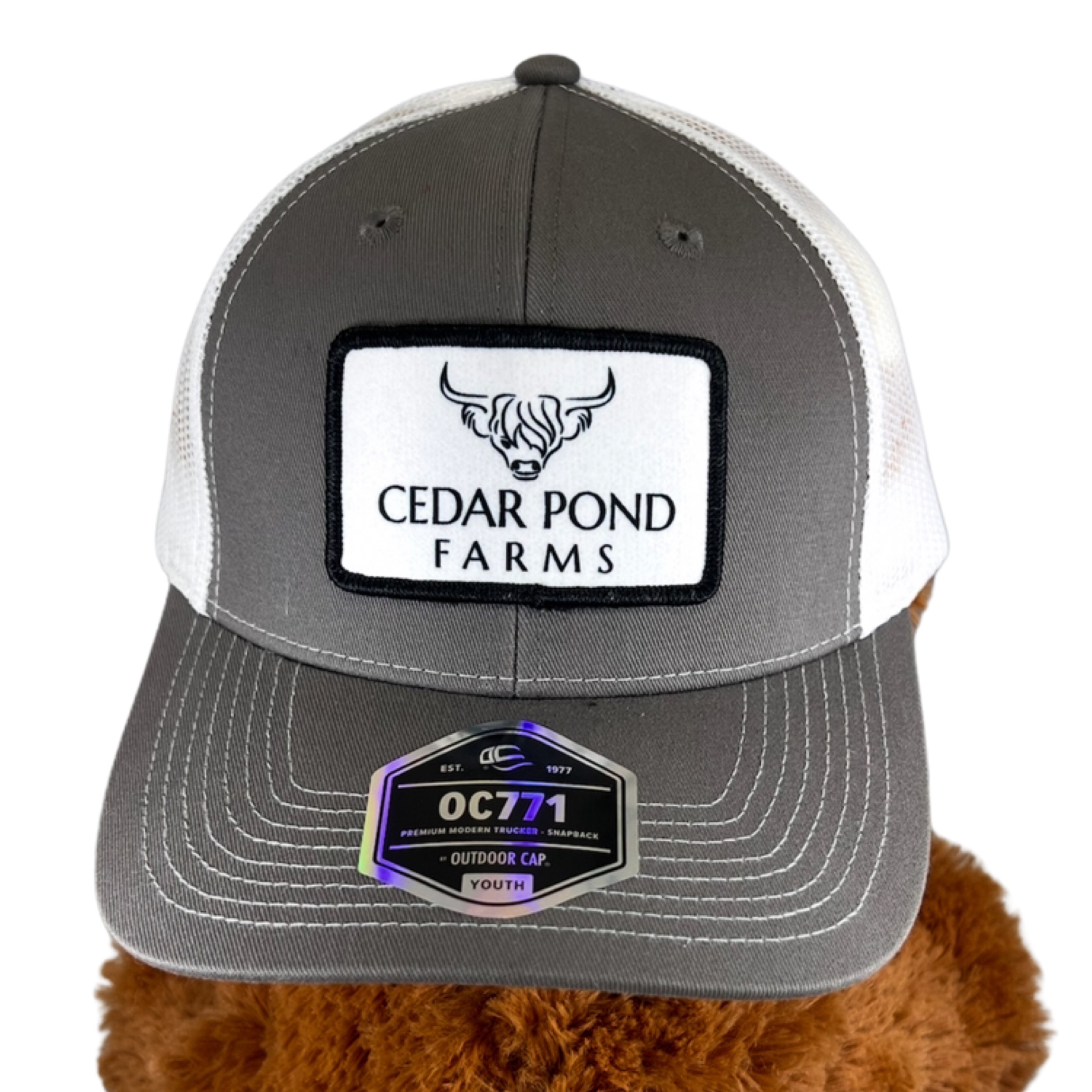 Cedar Pond Farms Trucker Hat at the Cedar Pond Farms gift shop — our fluffy Highland cow farm just outside the Smoky Mountains.