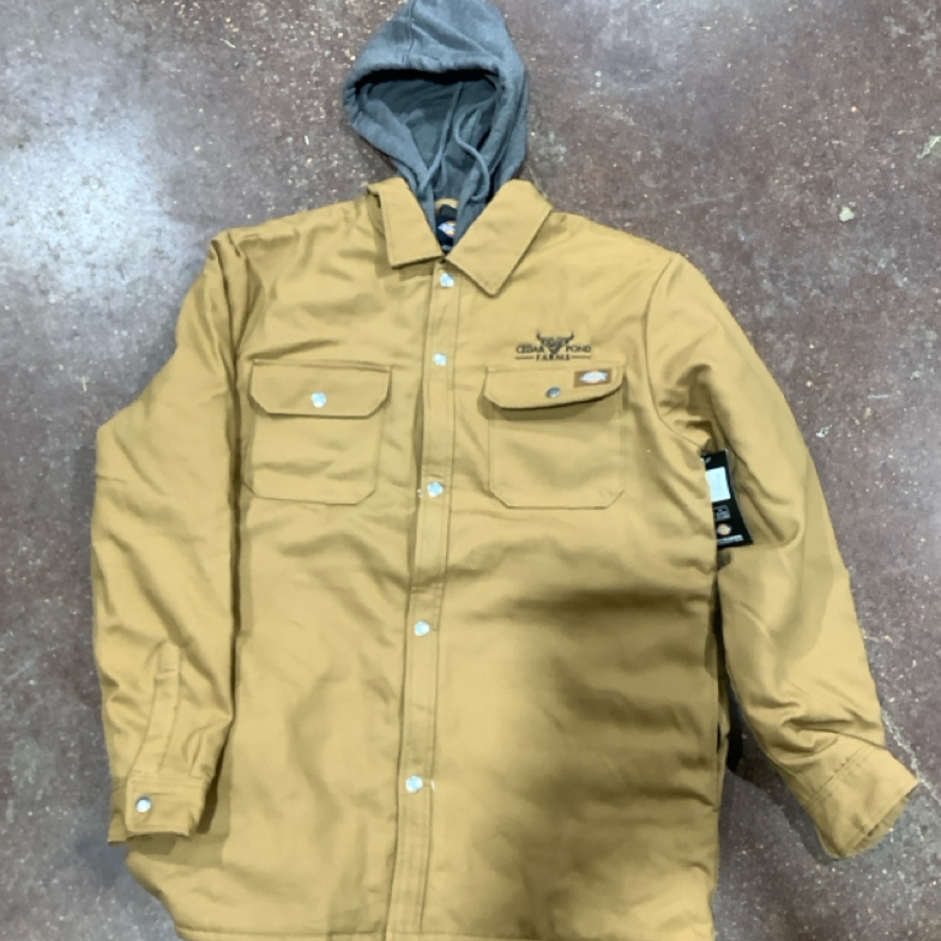 Dickies Jacket at the Cedar Pond Farms gift shop — our fluffy Highland cow farm just outside the Smoky Mountains.