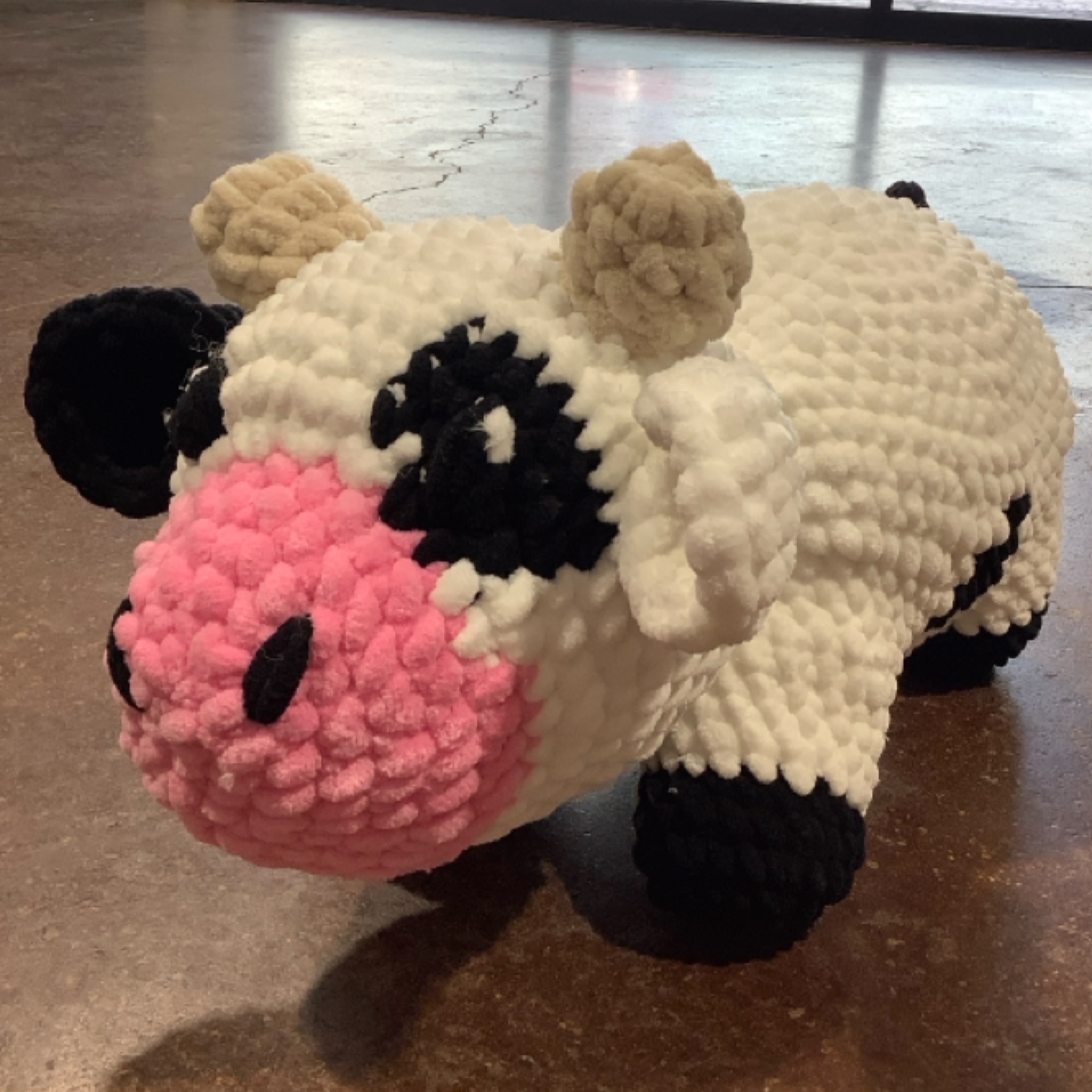 Crochet Black White Cow at the Cedar Pond Farms gift shop — our fluffy Highland cow farm just outside the Smoky Mountains.