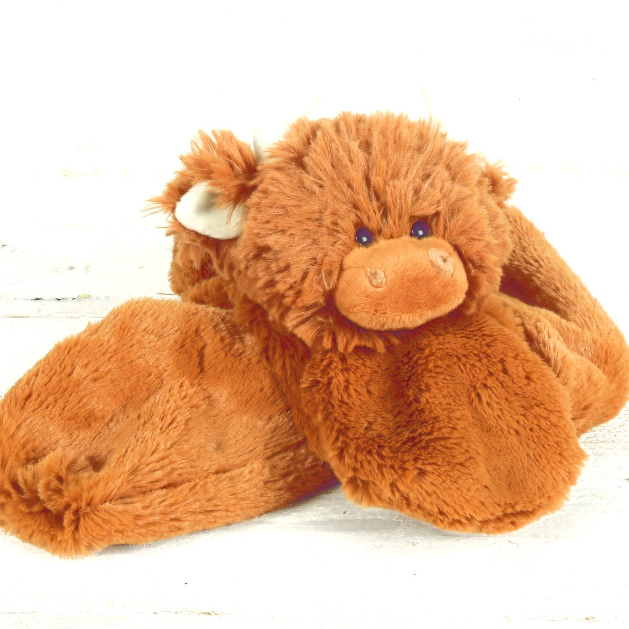 Highland Cow Scarf Plush at the Cedar Pond Farms gift shop — our fluffy Highland cow farm just outside the Smoky Mountains.