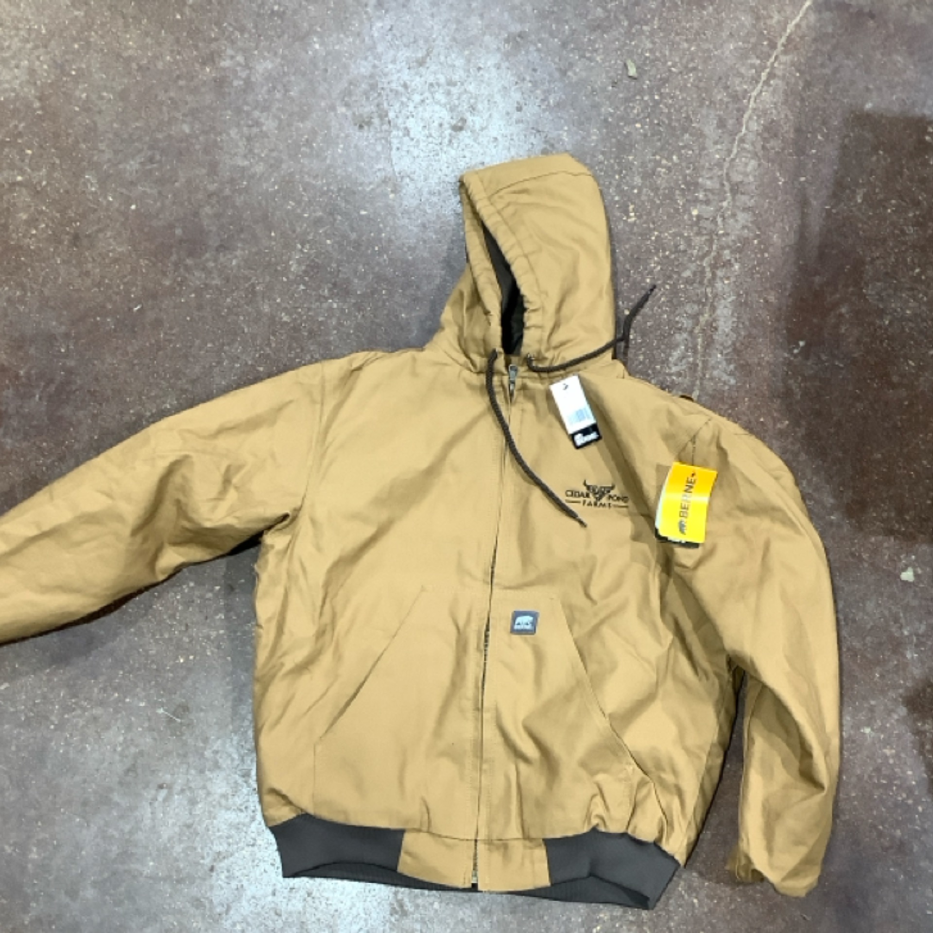 Berne Hooded Jacket at the Cedar Pond Farms gift shop — our fluffy Highland cow farm just outside the Smoky Mountains.