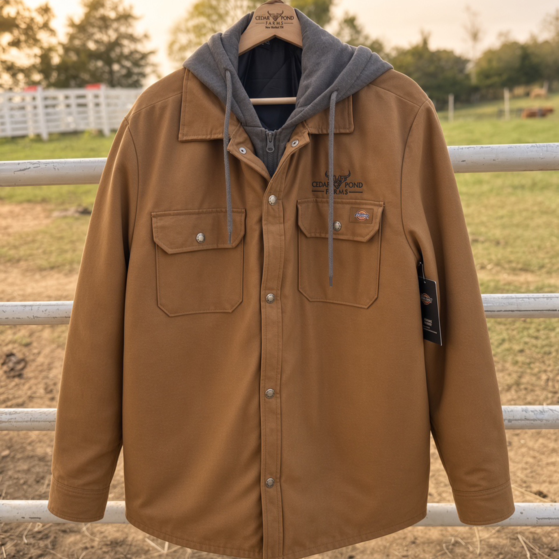Dickies Canvas Jacket with Grey Hood from the Apparel shelf at the Cedar Pond Farms gift shop — our fluffy Highland cow farm just outside the Smoky Mountains.