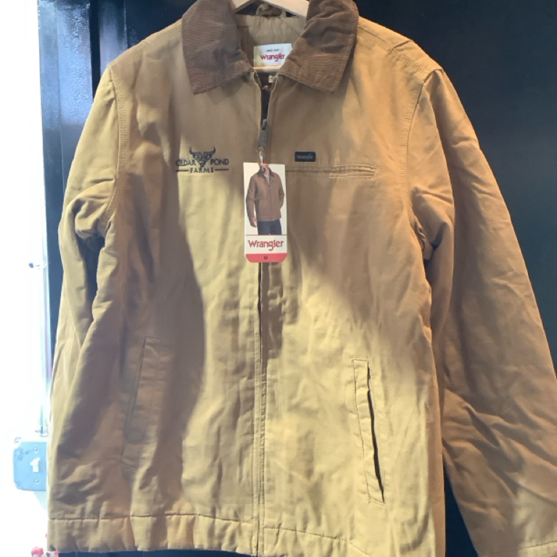 A closer look at Wrangler Canvas Coat, sold at Cedar Pond Farms in the Tennessee foothills near the Smokies.