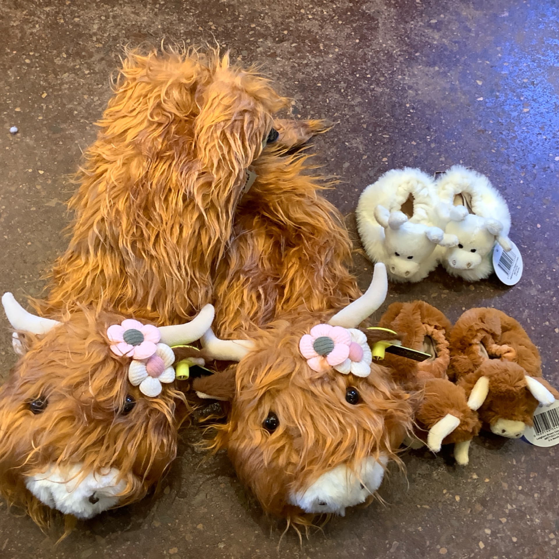 SLIPPERS — Brown Adult Slippers from the APPAREL shelf at the Cedar Pond Farms gift shop — our fluffy Highland cow farm just outside the Smoky Mountains.
