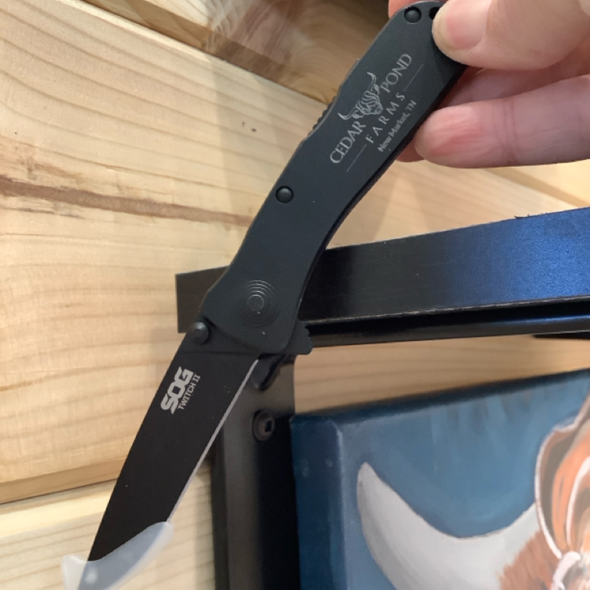Pocket Knife at the Cedar Pond Farms gift shop — our fluffy Highland cow farm just outside the Smoky Mountains.