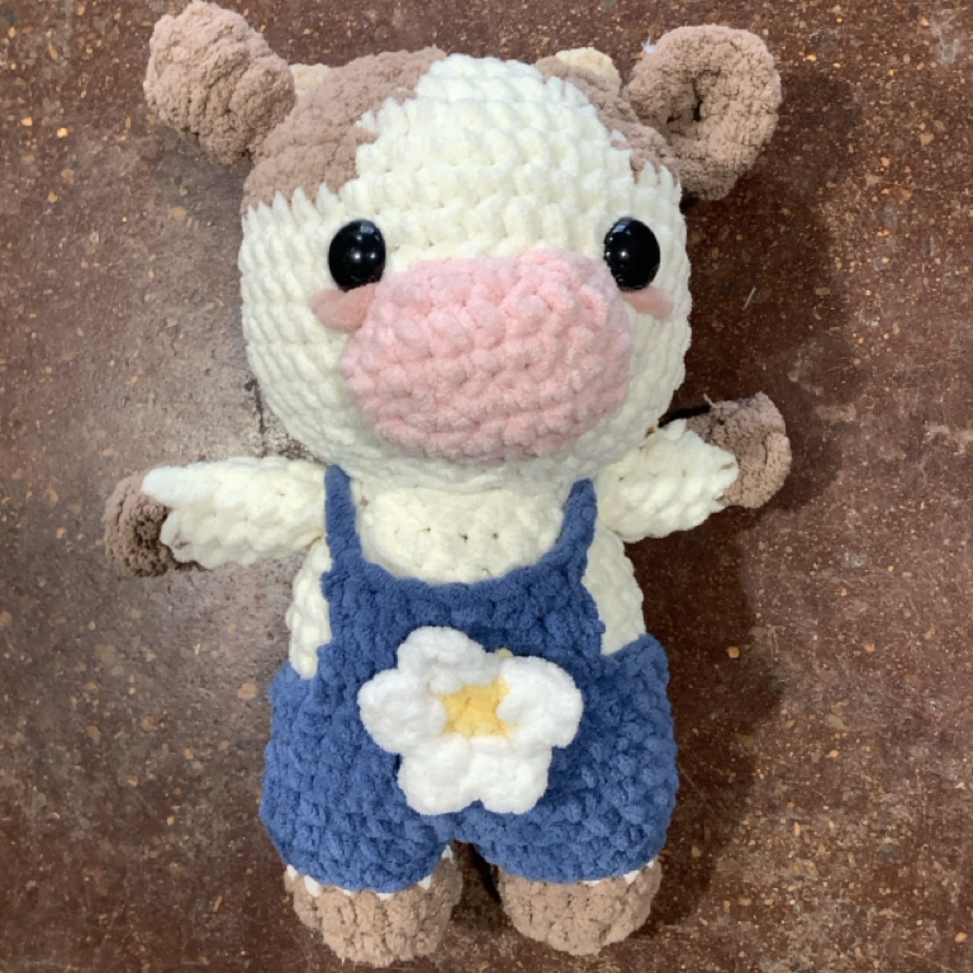 Crochet Cow in Overalls at the Cedar Pond Farms gift shop — our fluffy Highland cow farm just outside the Smoky Mountains.