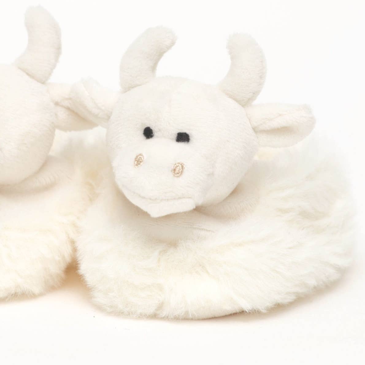 Highland Cow Plush Baby Slippers at the Cedar Pond Farms gift shop — our fluffy Highland cow farm just outside the Smoky Mountains.
