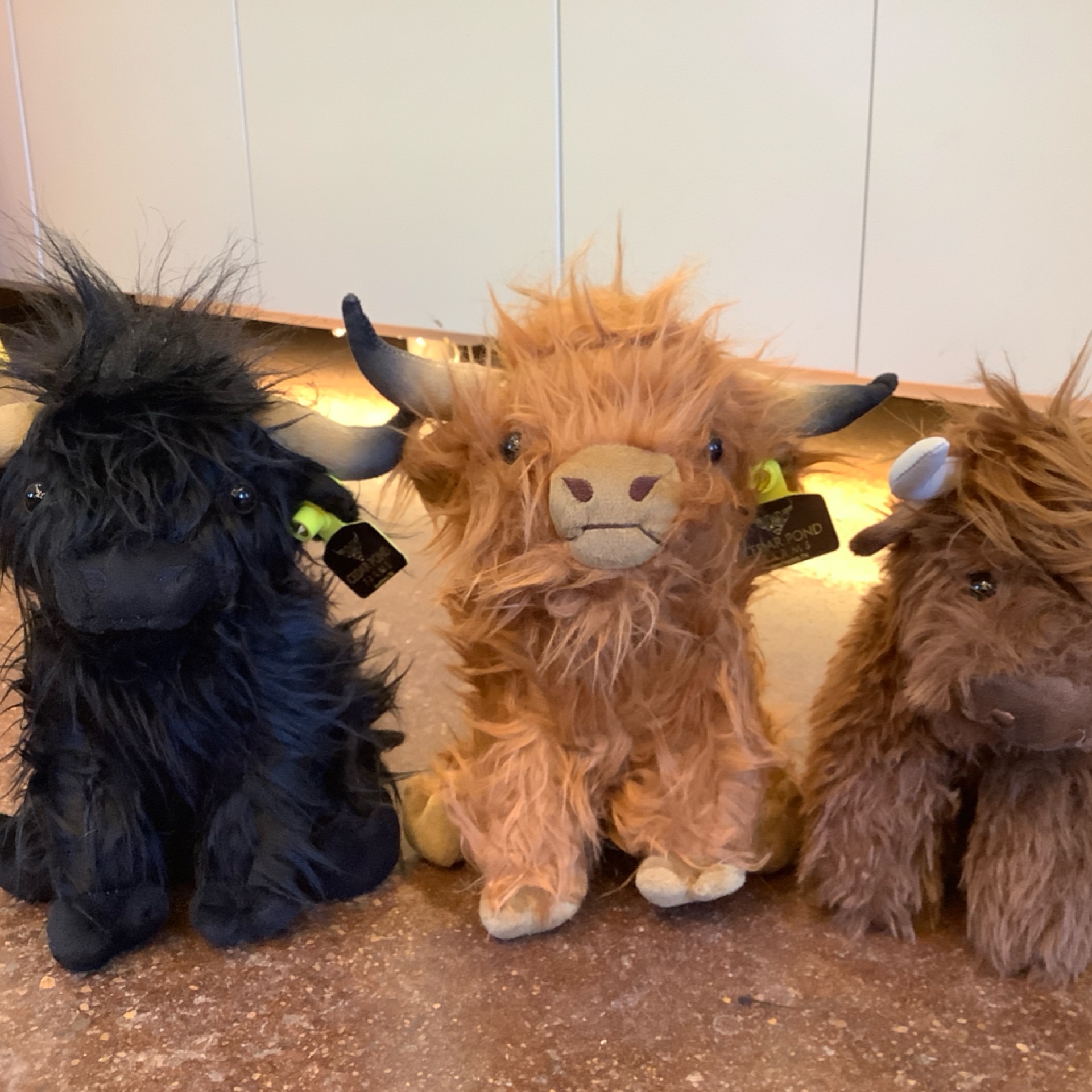 MEDIUM COW — Chocolate Brown Cow from the STUFFIES shelf at the Cedar Pond Farms gift shop — our fluffy Highland cow farm just outside the Smoky Mountains.