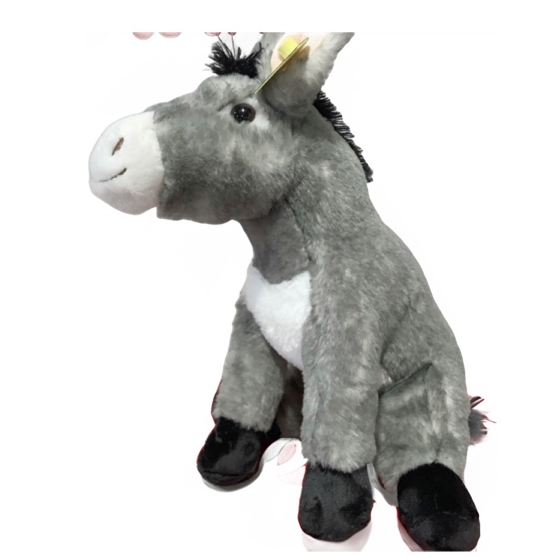 Big Donkey Stuffed Animal at the Cedar Pond Farms gift shop — our fluffy Highland cow farm just outside the Smoky Mountains.