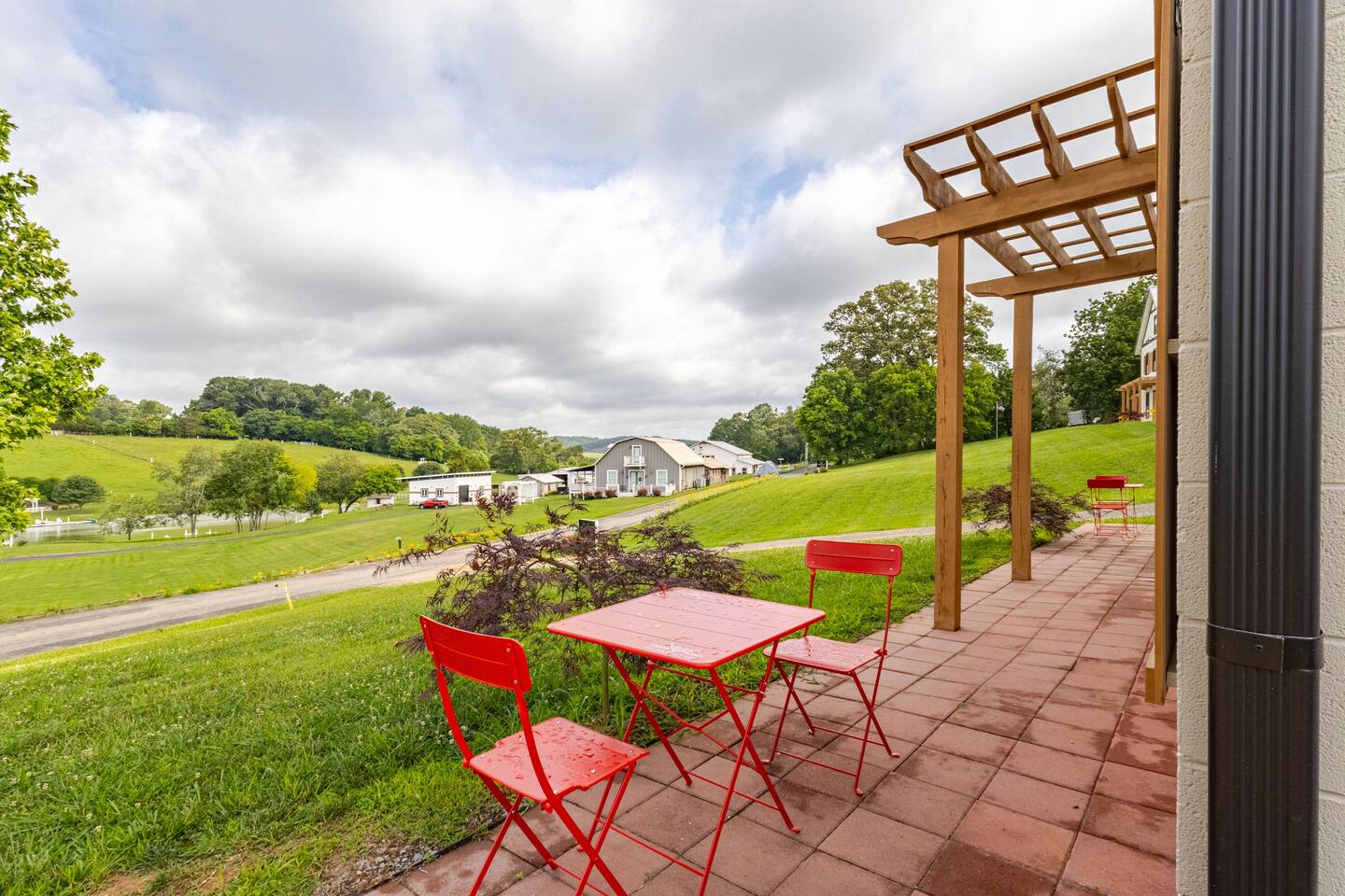 Inside Barndo 1A · South one-bedroom, a one-bedroom barndominium suite at Cedar Pond Farms — our fluffy Highland cow farm just outside the Smoky Mountains.