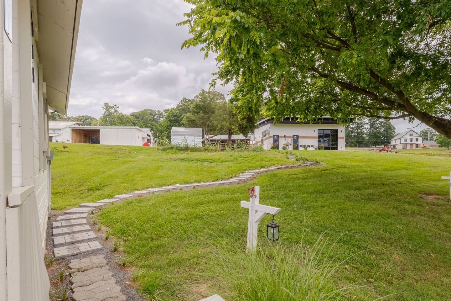 FishHouse Tiny Home at Cedar Pond Farms — lakeside tiny home lodging on the farm, with the Highland herd a short walk away.